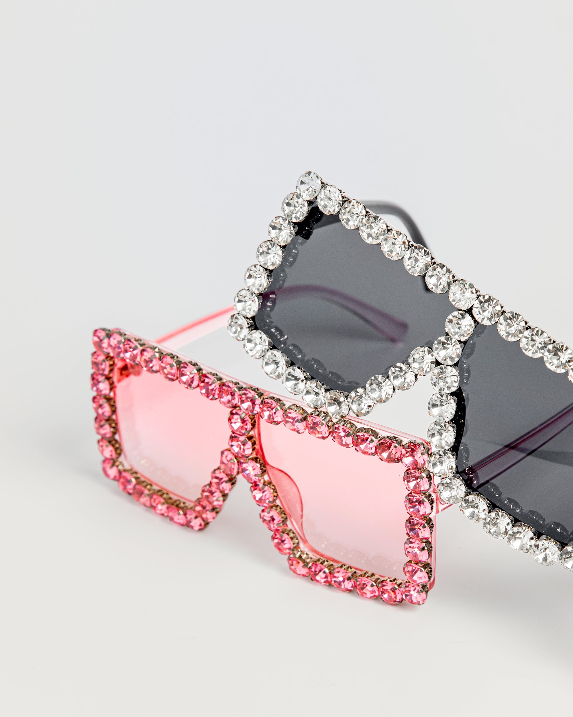 Group photo of black and pink Square Diamond Frame Sunglasses with rhinestone trim