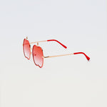 Apple Delight sunglasses in red with gold arms and bright red temple tips