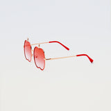 Apple Delight sunglasses in red with gold arms and bright red temple tips