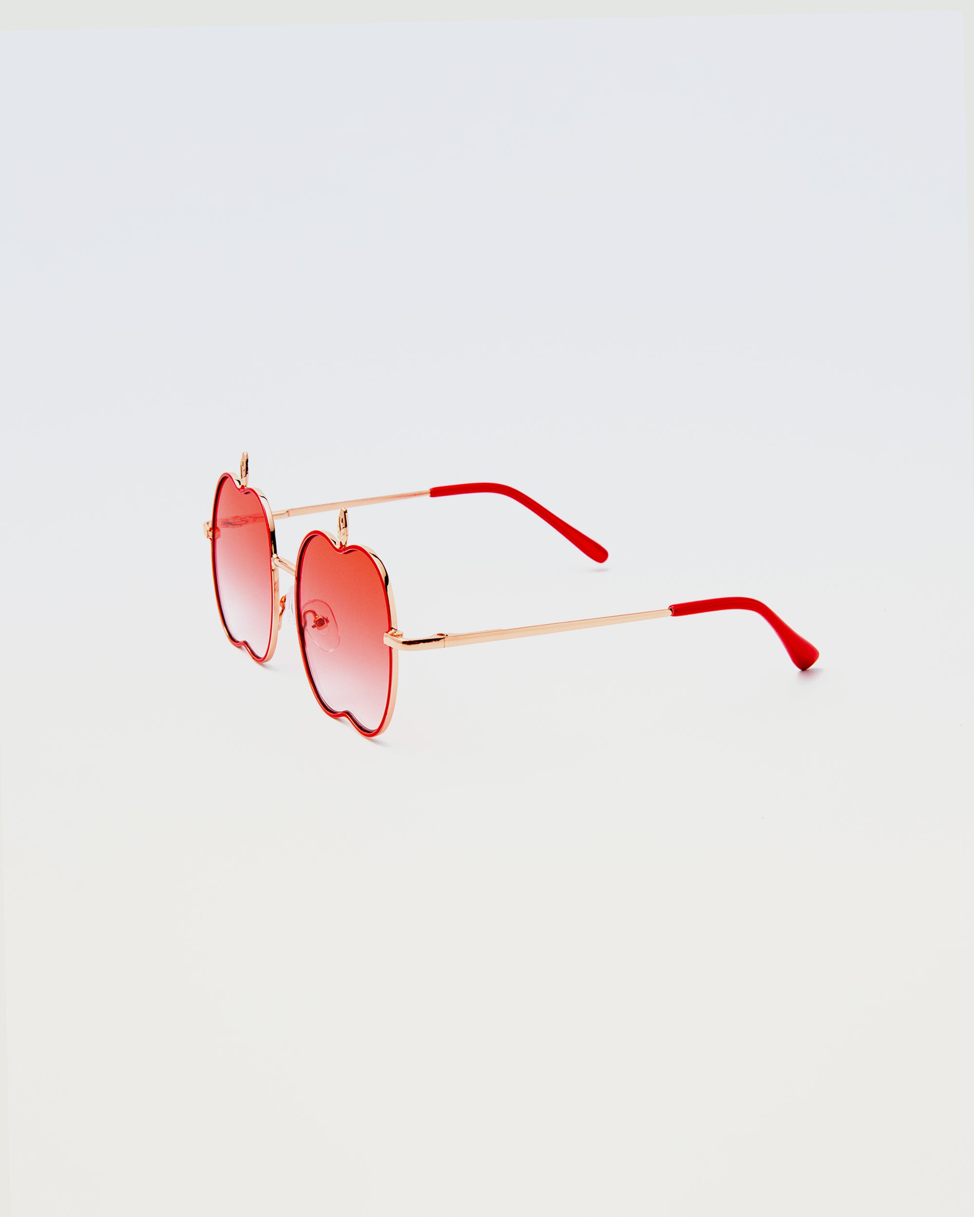 Apple Delight sunglasses in red with gold arms and bright red temple tips