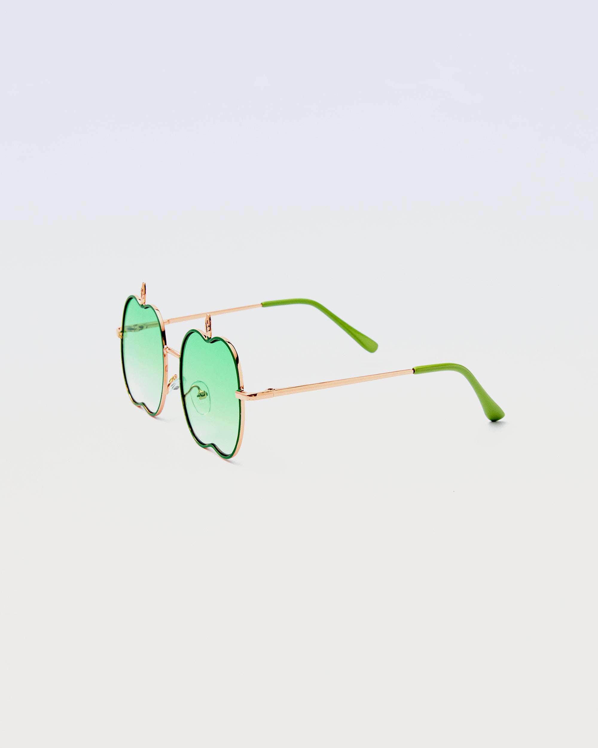 Apple Delight sunglasses in green with gold frame and green temple tips