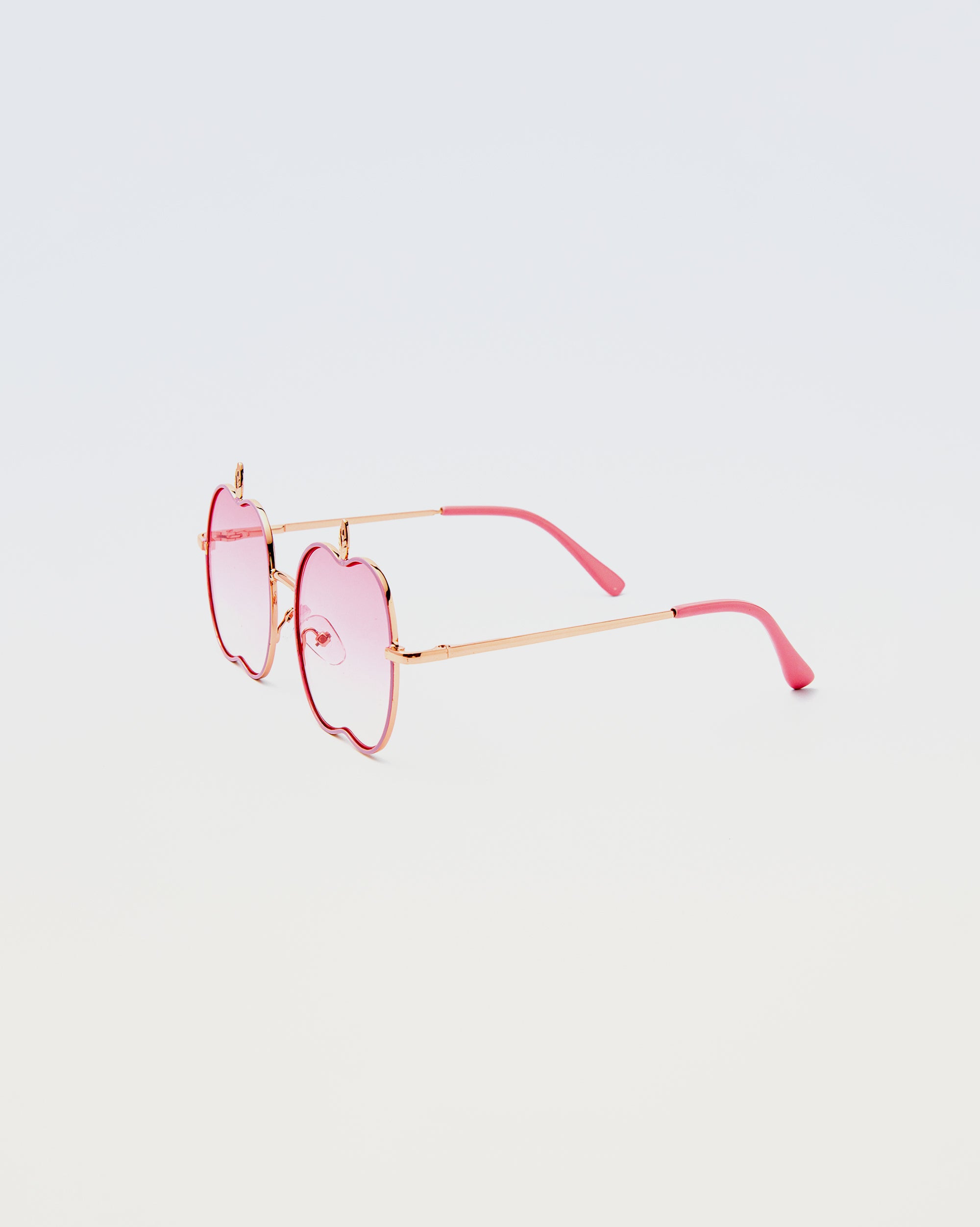 Apple Delight sunglasses in pink with rose-colored lenses and pink arms