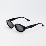 Vero Sunglasses in bold black with oval frames and dark lenses for kids