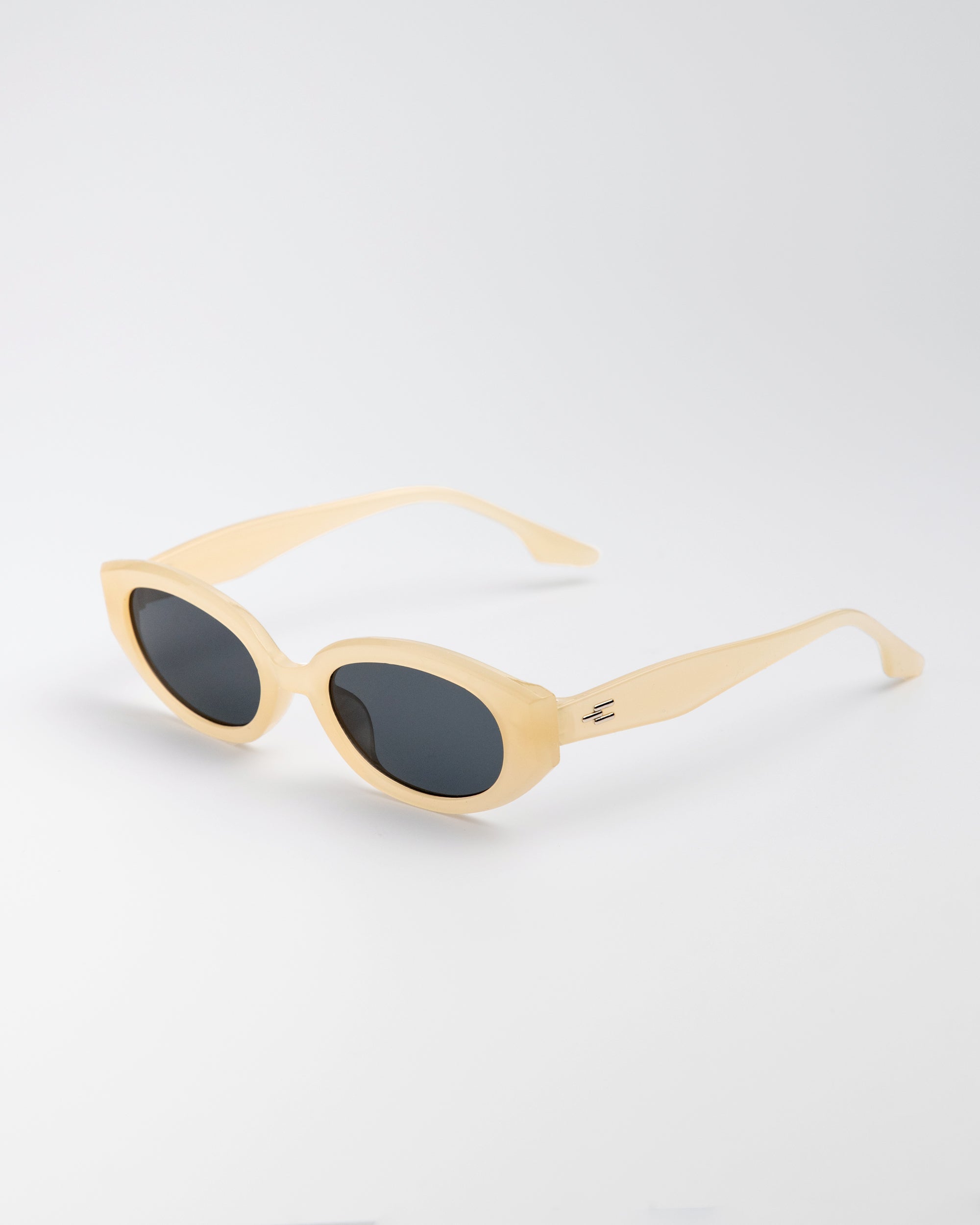 Vero Sunglasses in cream with dark lenses and curved oval shape for kids
