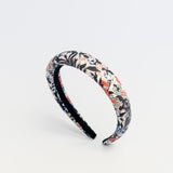 Deep Flora Headband for kids with multicolor floral pattern on white background
