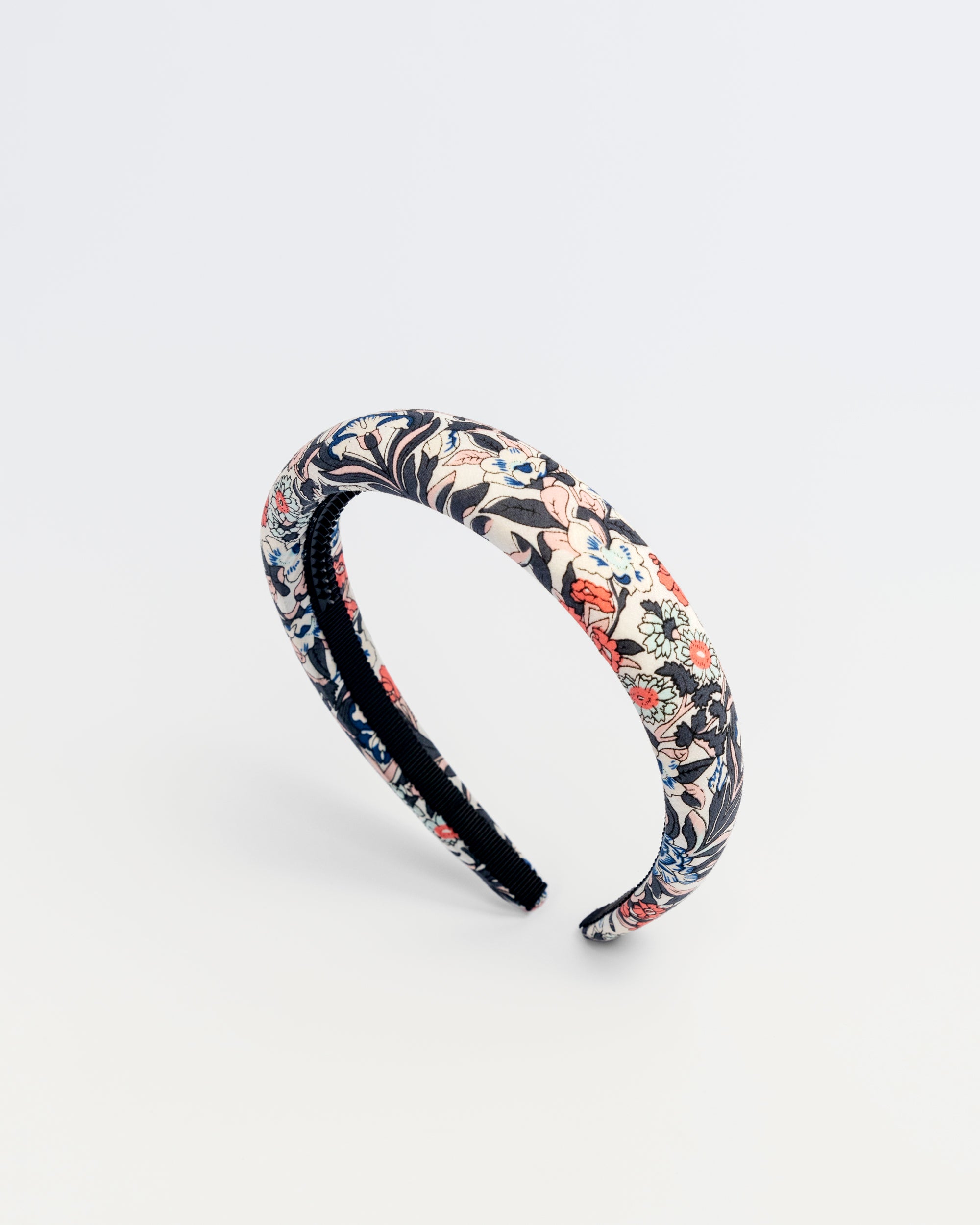 Deep Flora Headband for kids with multicolor floral pattern on white background
