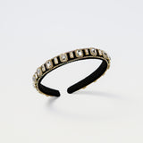 Black kids headband with clear rectangular gems and gold trim