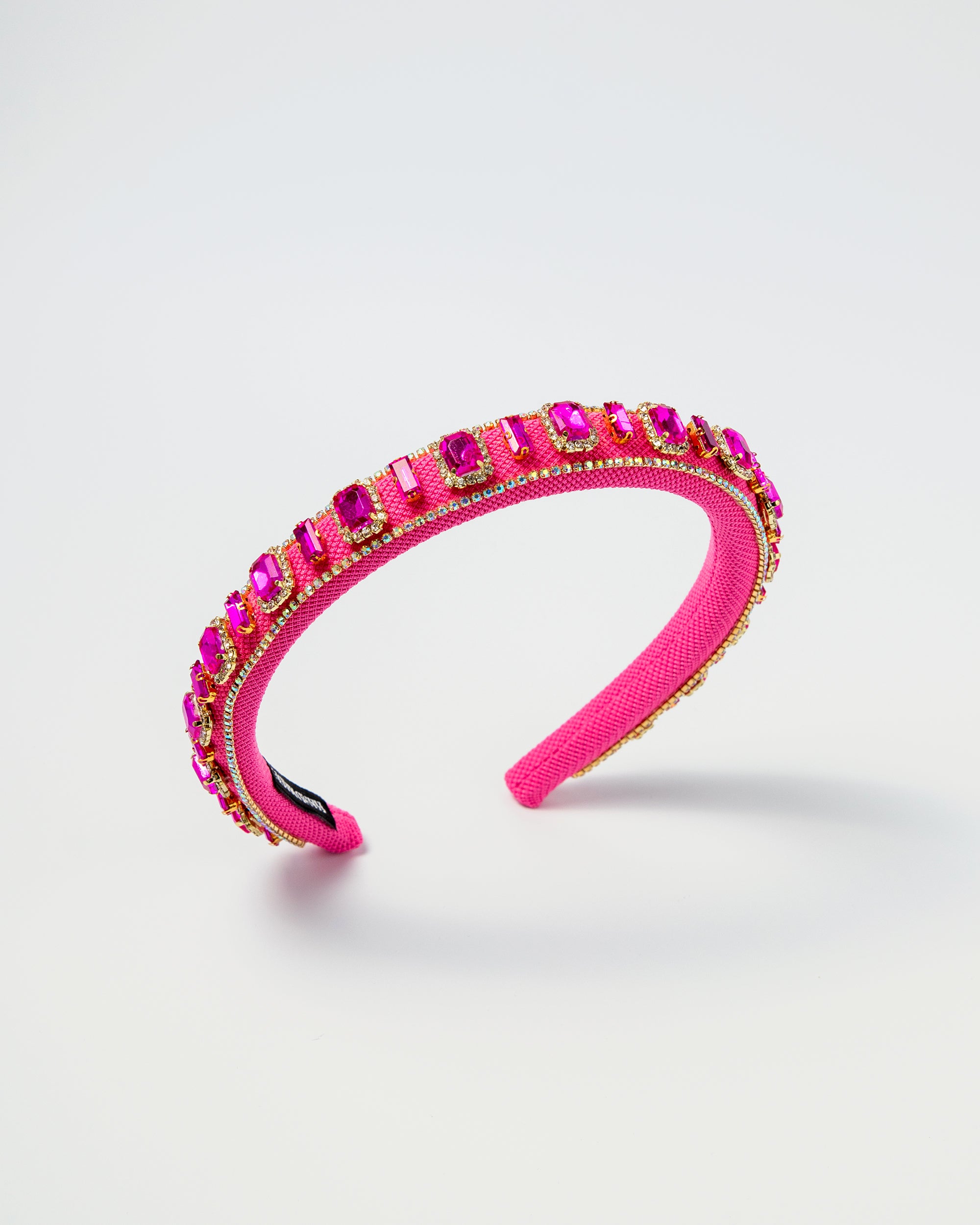 Hot pink kids headband with rectangular hot pink gems and gold detailing