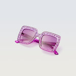 Sparkle Lilac Blooms sunglasses with rhinestone-studded lilac purple square frames and tinted lenses on white background