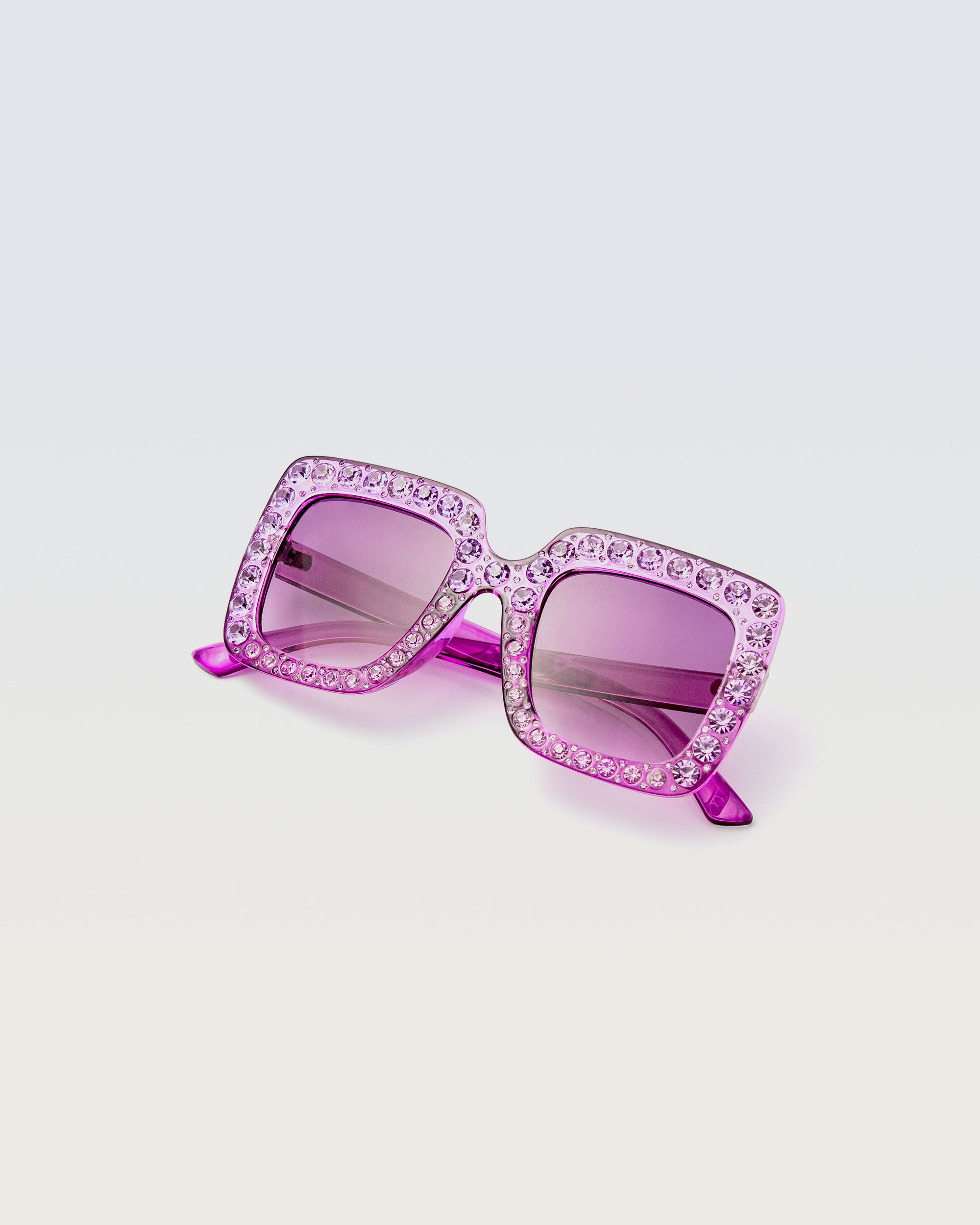 Sparkle Lilac Blooms sunglasses with rhinestone-studded lilac purple square frames and tinted lenses on white background