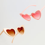 Group shot of colorful sweetheart princess sunglasses in the colors sugar cookie and pink for kids