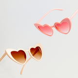 Group shot of colorful sweetheart princess sunglasses in the colors sugar cookie and pink for kids