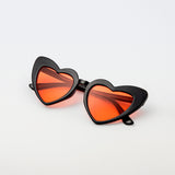 Orange heart sunglasses for children with fun and trendy style