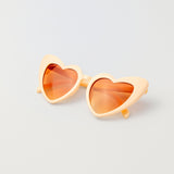 Cream-colored heart sunglasses for kids with soft princess appeal